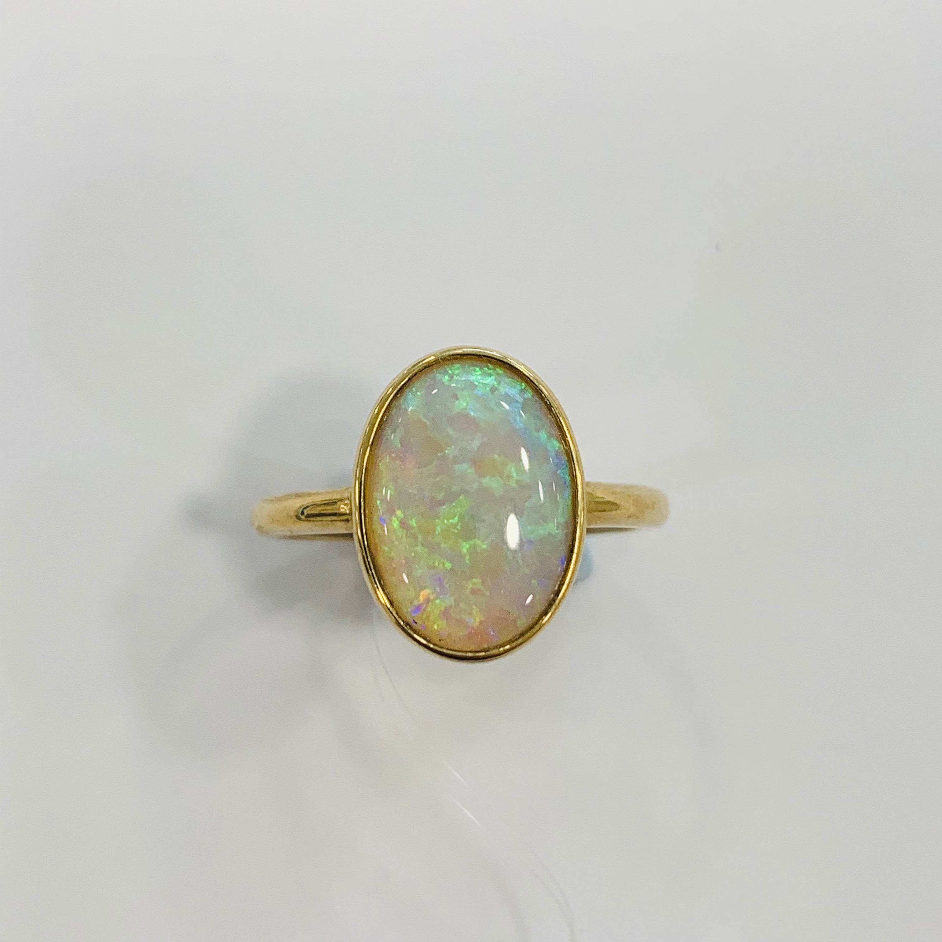9K Yellow Gold Bezel Set Opal Ring